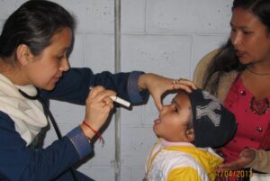 doctor checking child